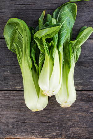 Pak Choi fresh on wooden table from aboveの写真素材