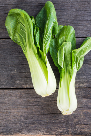 Pak Choi fresh on wooden table from aboveの写真素材