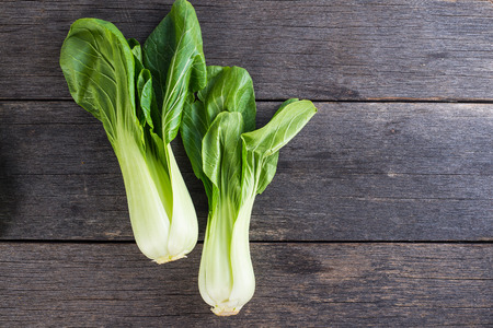 Pak Choi fresh on wooden table from aboveの写真素材