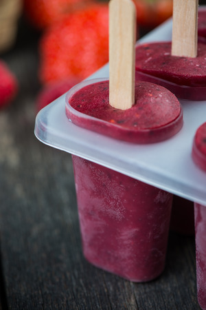 homemade summer fruit lolly pops, healthy refreshing snack for kidsの写真素材