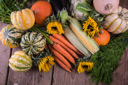 fresh from local market autumn vegetables and sunflowersの写真素材