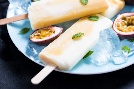 healthy and refreshing, homemade passion fruit and yogurt popsicleの写真素材