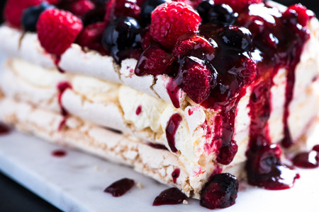 Sweet Pavlova with winter berry fruitsの写真素材