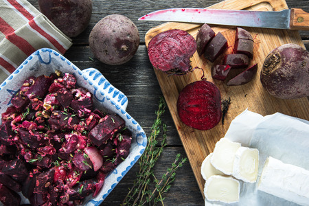 Simple food, beetroot bake with goats cheese, in rustic trayの写真素材