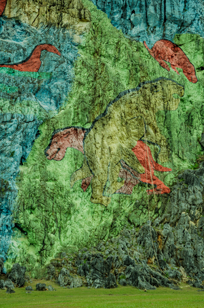 Prehistory Wall , Murale de la Prehistoria painted on rocks in Vinales, Cuba