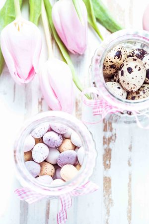 quai eggs in masson jar, Easter decoration in pastel pink vibrant colorsの写真素材