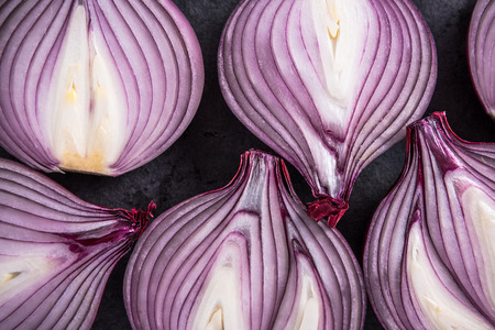 Red onion halves, texture details and pattern, flat lay from aboveの写真素材