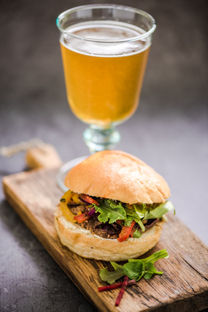 traditional gastro pub food, bbq beef bun with local beerの写真素材