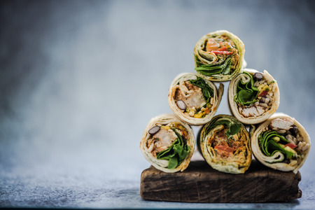 stack of mexican street food fajita wrap, copy space for textの写真素材