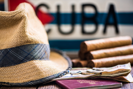 travel to Cuba concept, hat and cigars and passportの写真素材
