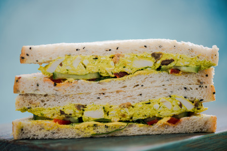 coronation chicken sandwich with white breadの写真素材