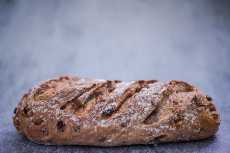 dark bread loaf with olives