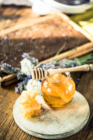Honey still life image on wooden tableの写真素材