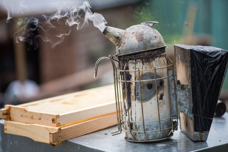 Smoker used for calming bees at apiaryの写真素材