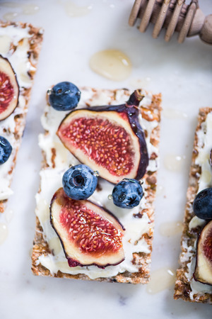 Wholegrain bread with autumn fruits, brunchの写真素材