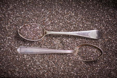 Chia seeds with wintage spoon, overhead viewの写真素材