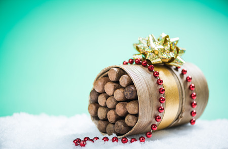 Luxury Christmas gift, cuban cigars with golden ribbonの写真素材