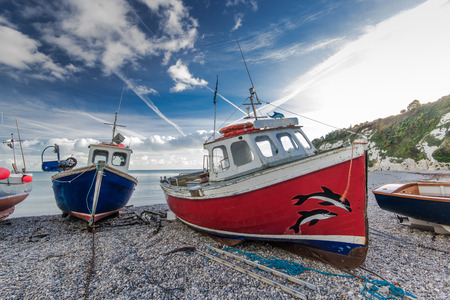 Fiherman boats on pebles at beach in Beer, Devon,UK. Jurassic coast british heritage.のeditorial素材