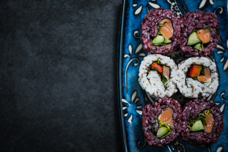 Black rice and chia seed sushi, raw healthy food. Novelty and alternative dish.の写真素材