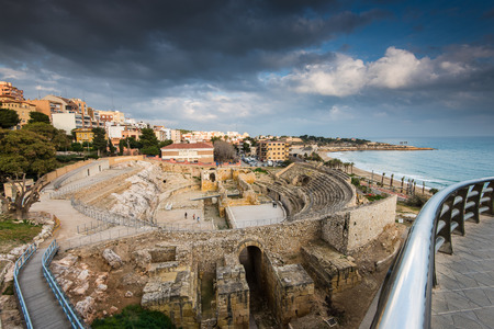 panoramic view of the ancient roman amphitheater of Tarragona, Spain, next to the Mediterranean seaの写真素材