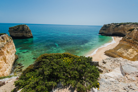Beautiful Algarve coast with cristal clear water, Portugal.の写真素材