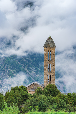 Clouds over Sant Miquel Engolasters church,Andorra.の写真素材