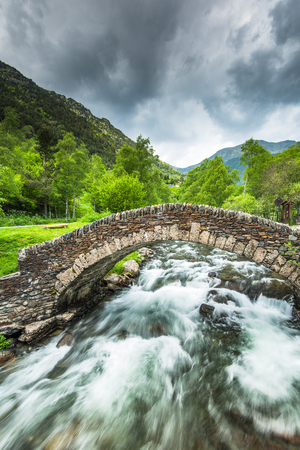 Dry stone medieval bridge in Andorra.の写真素材