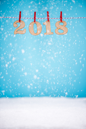 New Year celebration 2018 numbers agains copy space.
