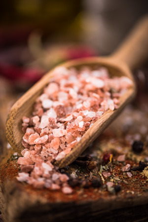 Himalayan salt on wooden spoon.の写真素材