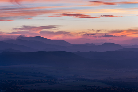 Stunning view over valley in high Tatra mountains after sunset.の写真素材