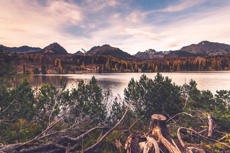 Beautiful alpine lake in high mountains with fall colors.の写真素材