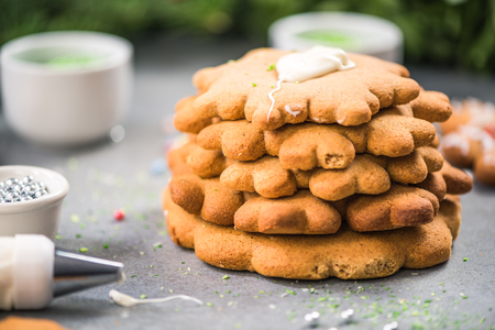 Making creative Christmas sweet decoration. Gingerbread Christmas tree.の写真素材