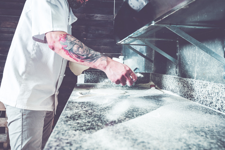 Chef working at local gasrtonomy kitchen.の写真素材