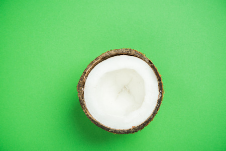 Coconut on green pastel background.Creative minimal layoutの写真素材