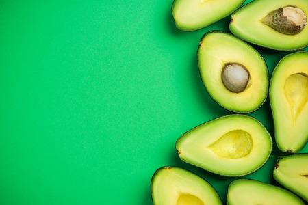 Avocado on pastel background,creative food concept.