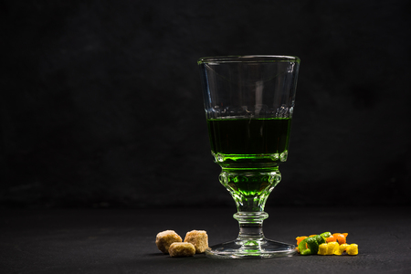 Green Absinthe in crystal glass.の写真素材