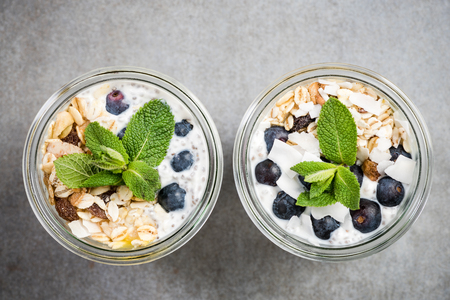 Blueberry,oats and coconut layered jar breakfast.の写真素材