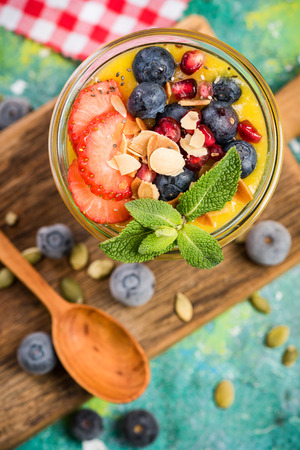 Jar with layered fruits and superfood. Top view.の写真素材