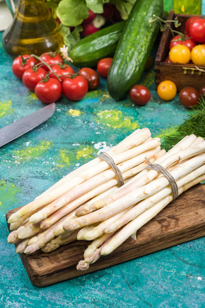 White asparagus on kitchen table, spring season.の写真素材