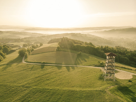 Beautiful aerial view over hills at sunrise.