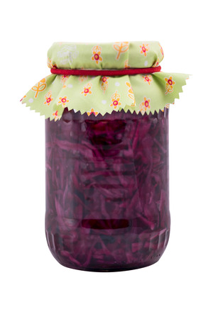 Jar with fermented and preserved red cabbage, isolated on whiteの写真素材