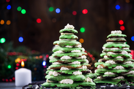 Gingerbread Christmas tree on festive decorated table.の写真素材