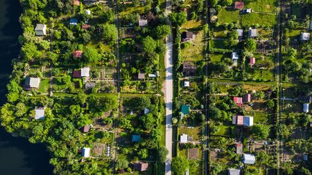 Tiny Ecological Friendly City Plot Gardens on Lake Edge, Aerial Top Down View.の写真素材