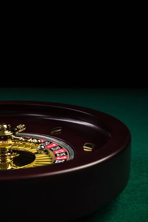 Roulette Drum on Green Casino Felt Table.