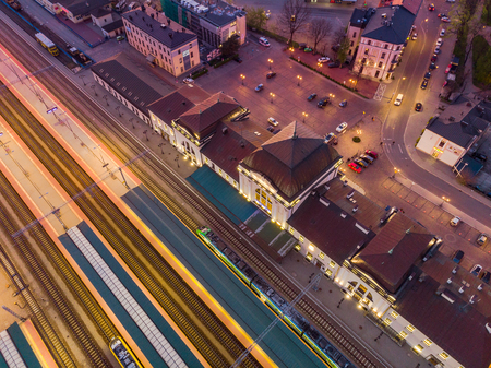 Rail station in Tarnow,Poland illuminated at twilight.のeditorial素材