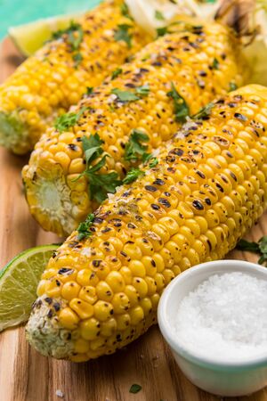 BBQ Grilled COrn on Cob with Lime and Coriander. Mexican Street Food.の写真素材