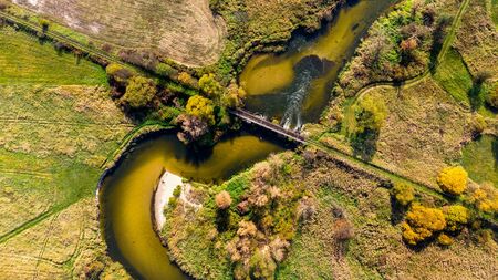Old Bridge Over Nida River Bend in Swietokrzyskie,Poland. Aerial Drone View.の写真素材
