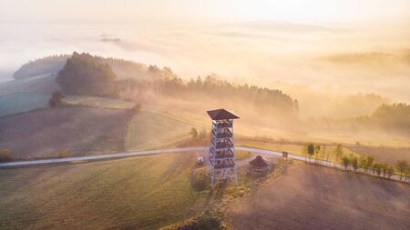 Look Out Tower in Brusnik,Ciezkowice. Polish Landscape at Foggy Sunrise.の写真素材