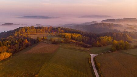 Polish Countryside at Autumnal Sunrise and Fog. Aerial Drone View.