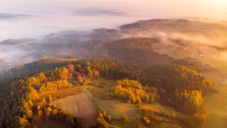 Colorful Sunrise over Forest and Countryside in Poland. Aerial Drone View.の写真素材